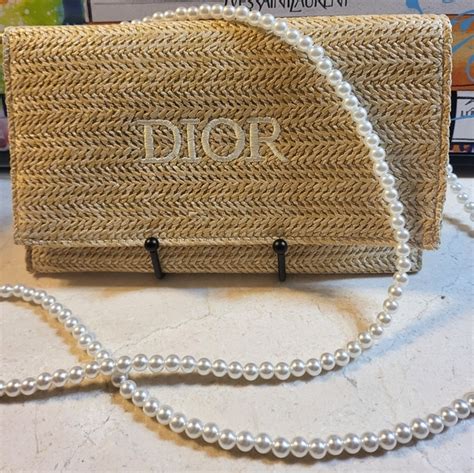 raffia clutch dior|Dior raffia bag.